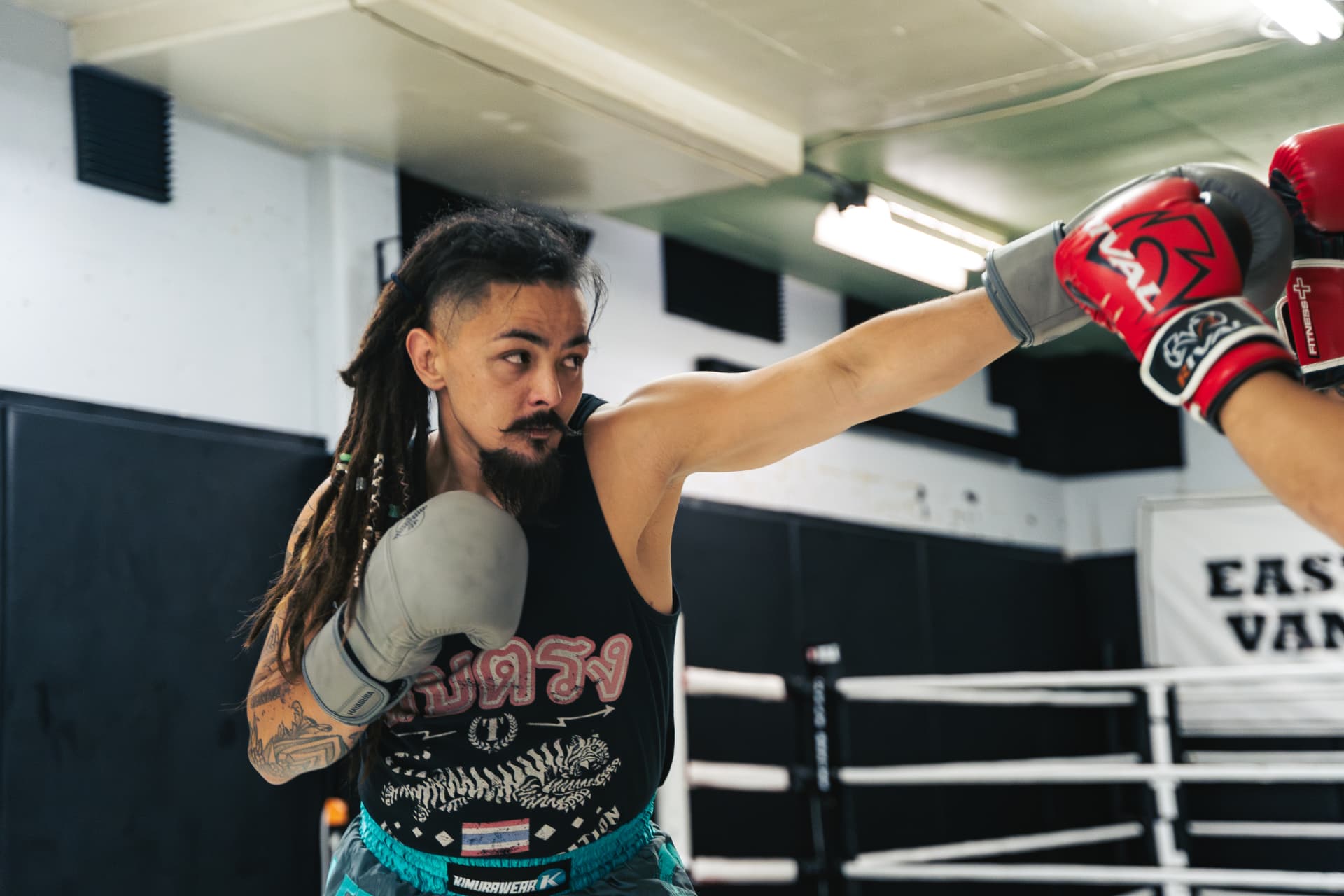 Matt Ayuen throwing a jab in the ring